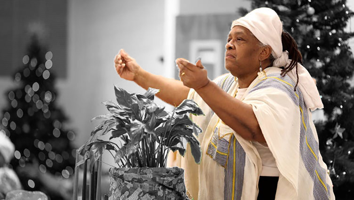 Nana Yaa is seen during the 32nd Annual Citywide Kwanzaa Celebration at the Immaculate Heart of Mary Catholic Church. Dec. 30, 2013 Aaron Borton/ Special to The Courier-Journal Aaron Borton/ Special to The Courier-Journal